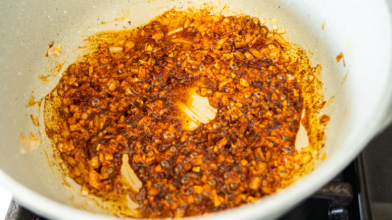 onions and spices sauteeing