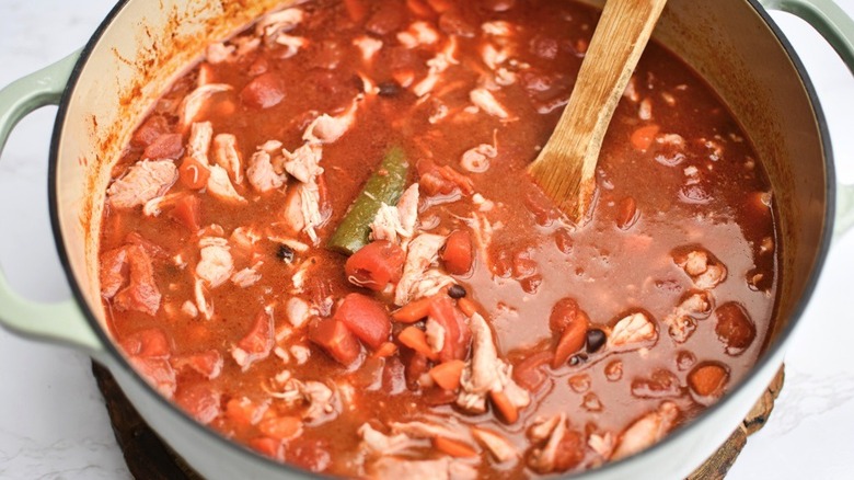 simmering spicy chicken soup