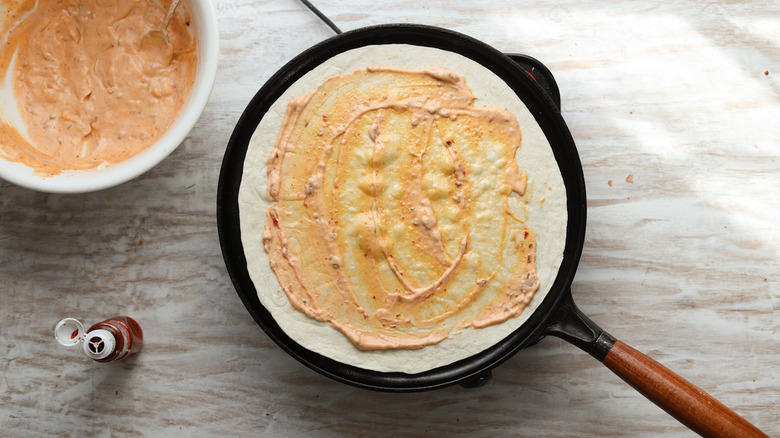 flour tortilla covered in mayonnaise