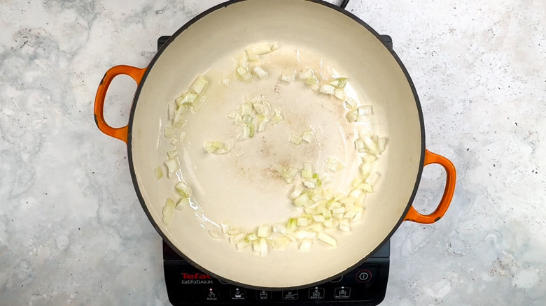 onion frying in pan