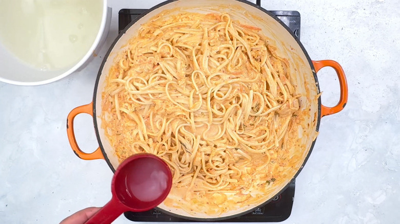 cooking liquid added to pasta