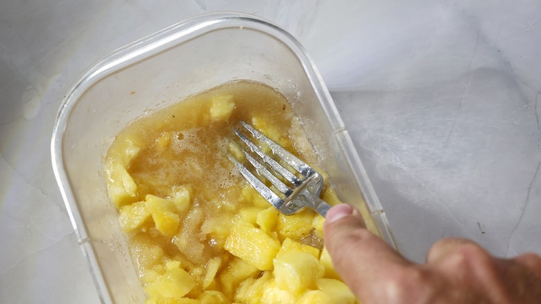 macerating cubed pineapple