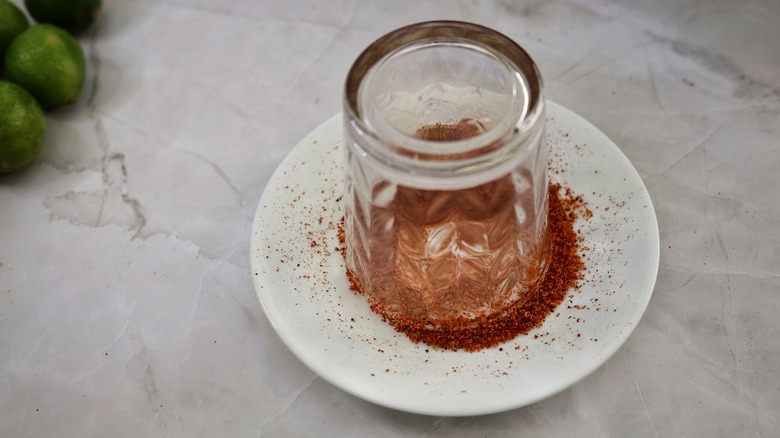 glass inverted on plate of tajin