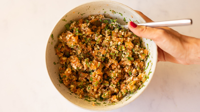 salmon burger ingredients in mixing bowl 