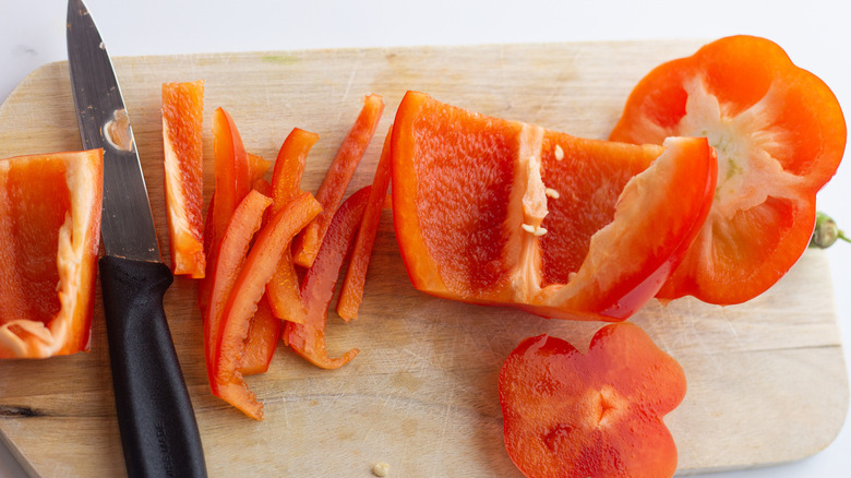 Sliced red pepper on cutting board