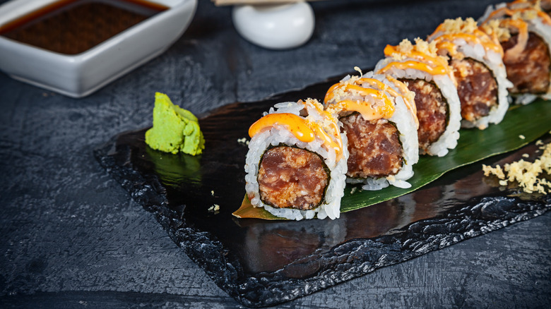 Spicy tuna roll on plate