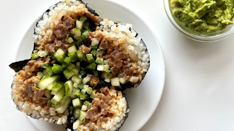 sushi burrito with rice, tuna, cucumber