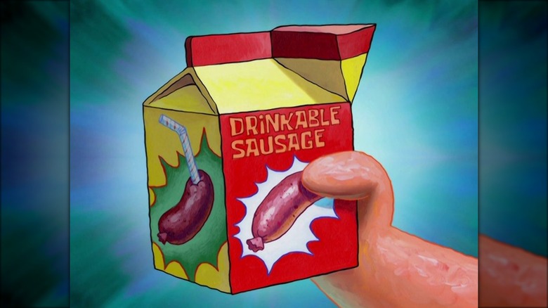 Patrick holding drinkable sausage