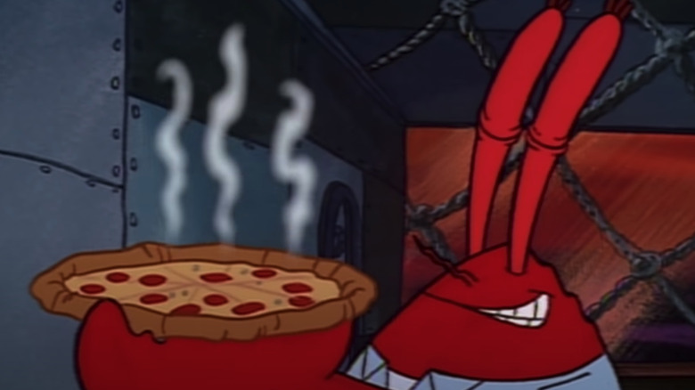 Mr. Krabs holding pizza