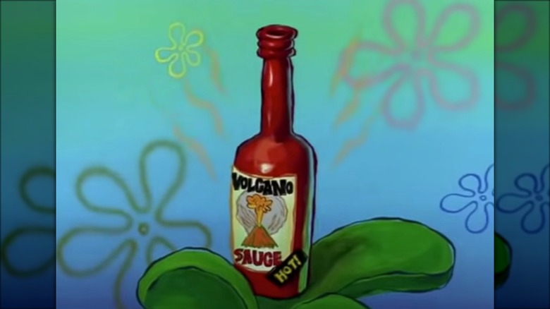 Sandy holding Volcano Sauce