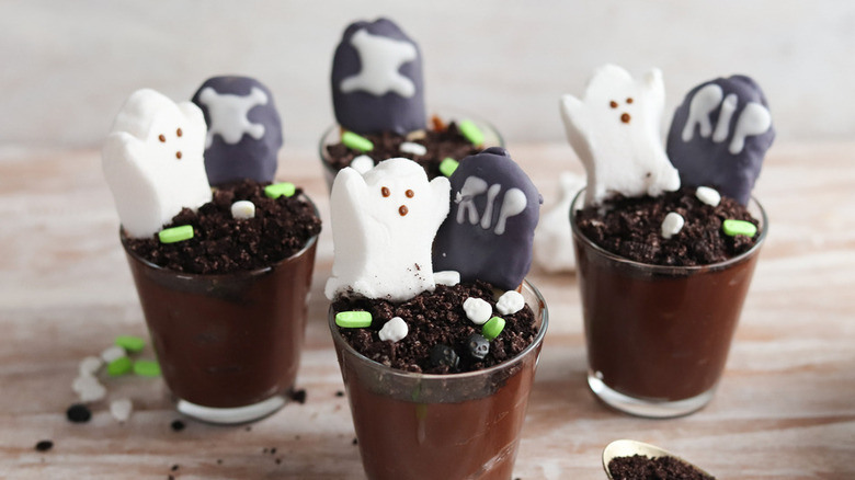 pudding cups with Halloween toppings