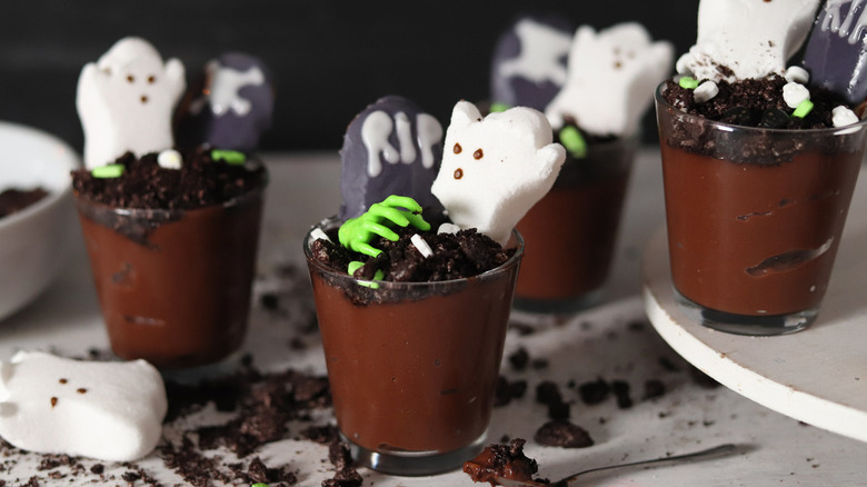 pudding cup with Halloween candy toppings