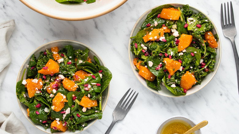 squash pomegranate salad in bowl 