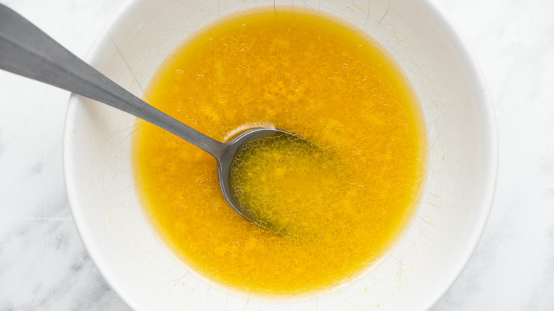 squash pomegranate dressing in bowl 