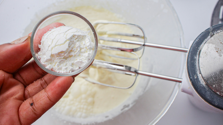 adding cornstarch to whipped cream