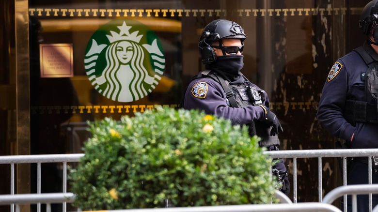 starbucks store with police officer