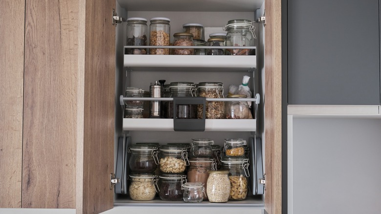 Repurposed glass jars in pantry