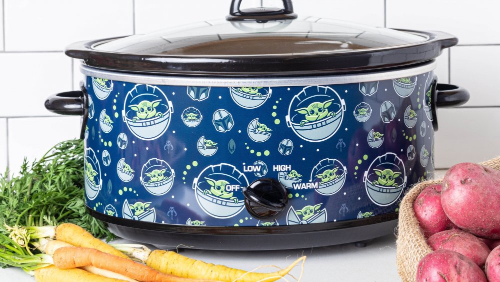 https://www.mashed.com/img/gallery/star-wars-fans-need-this-baby-yoda-slow-cooker/intro-1604604639.jpg