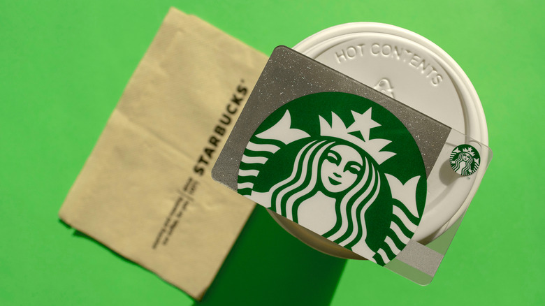 Starbucks reward card on cup