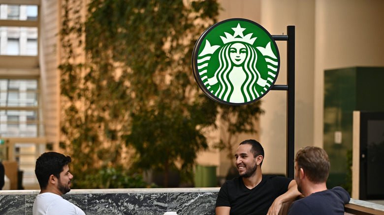 customers sitting inside starbucks