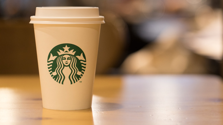 Starbucks hot drink cup on a table