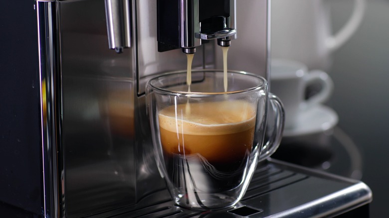 espresso machine filling glass mug