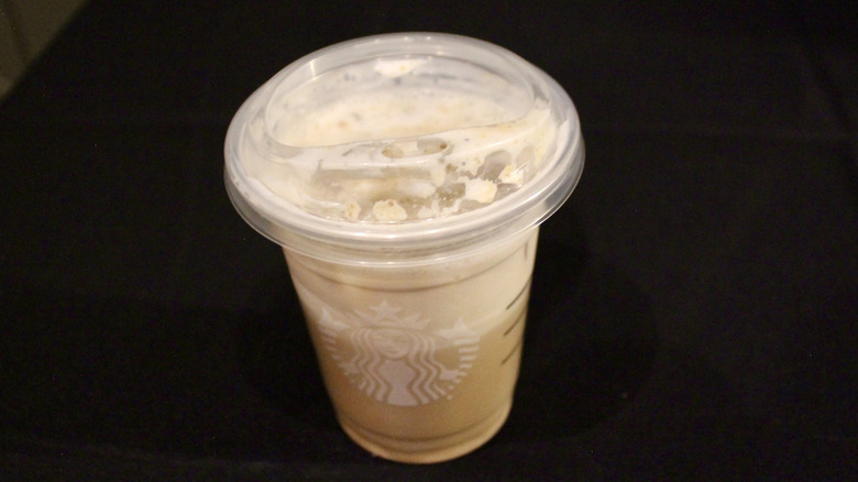 Iced Starbucks latte with lid