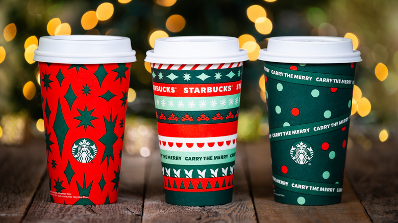 Three different Starbucks Christmas cups