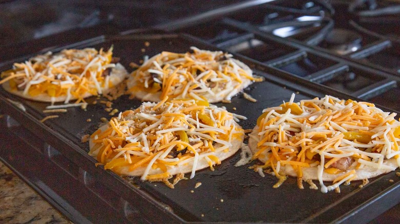 building steak quesadillas on skillet