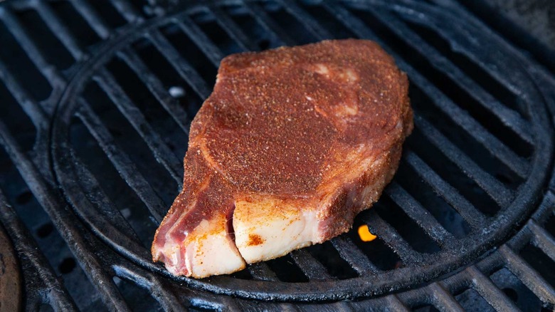 spice rubbed steak on grill