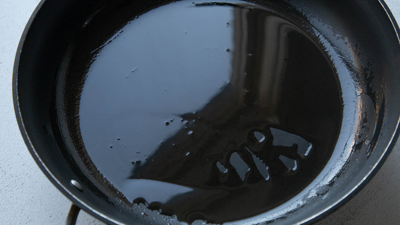 oil heating in skillet