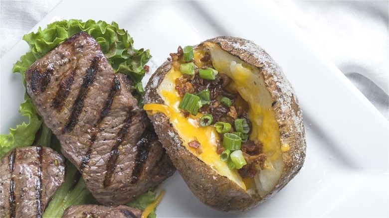 Loaded baked potato with steak