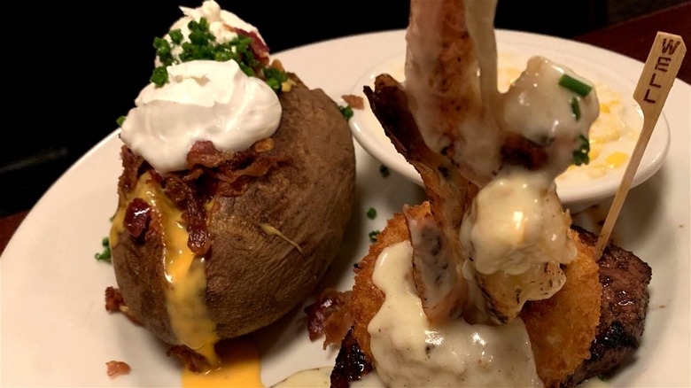 Loaded baked potato with steak and shrimp