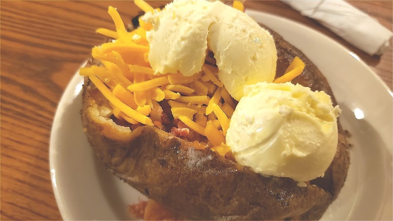 Loaded baked potato with butter