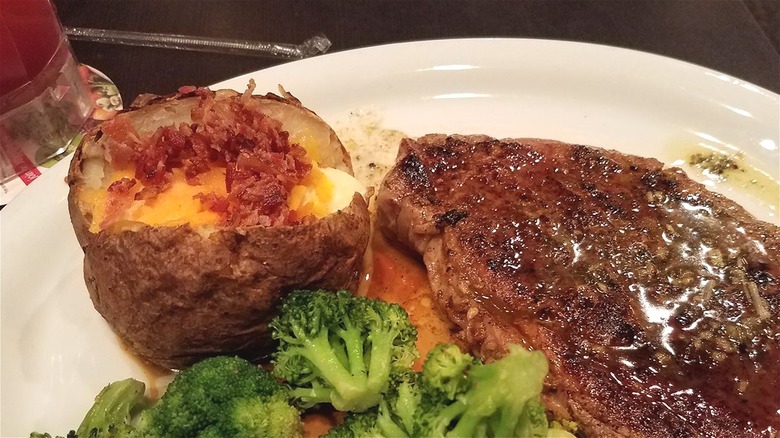 Loaded baked potato with steak