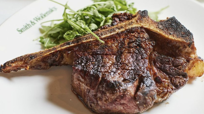 Bone in steak and arugula salad