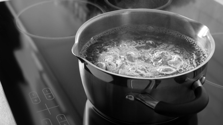 Pot with boiling water