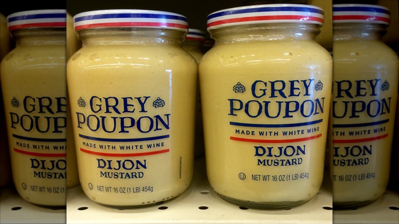 Jars of Grey Poupon dijon mustard