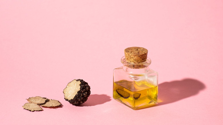 Truffle oil on pink background