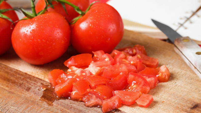 diced tomatoes on chopping board