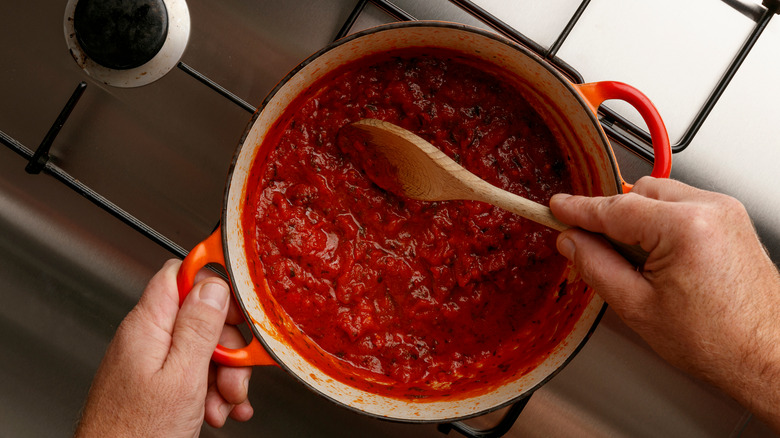 tomato sauce simmering on stove