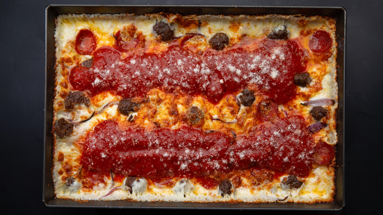 Detroit pizza with two rows of sauce