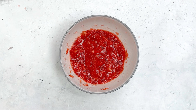 mashed strawberries in bowl