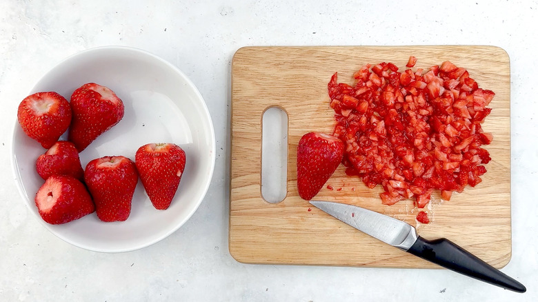 diced strawberries on chopping board