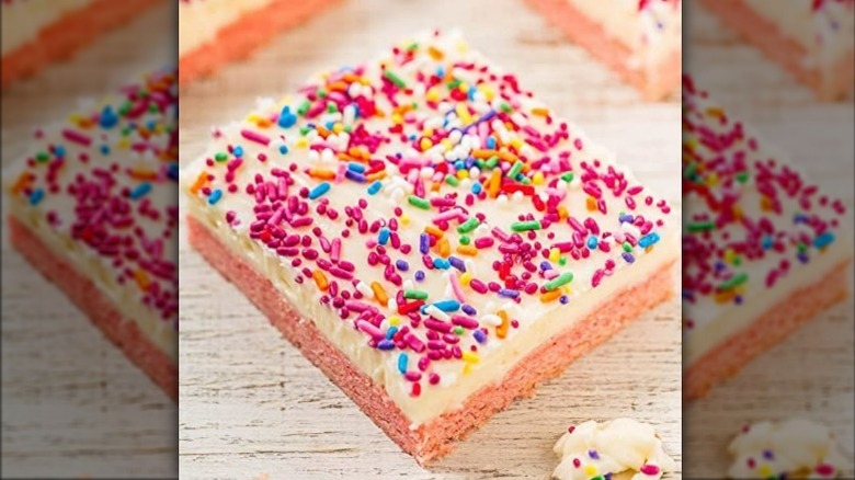 Strawberry cake slice with sprinkles