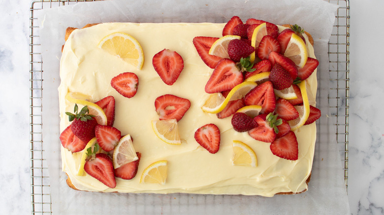 strawberry lemon cake on rack