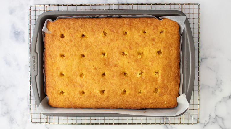 cake with holes on rack