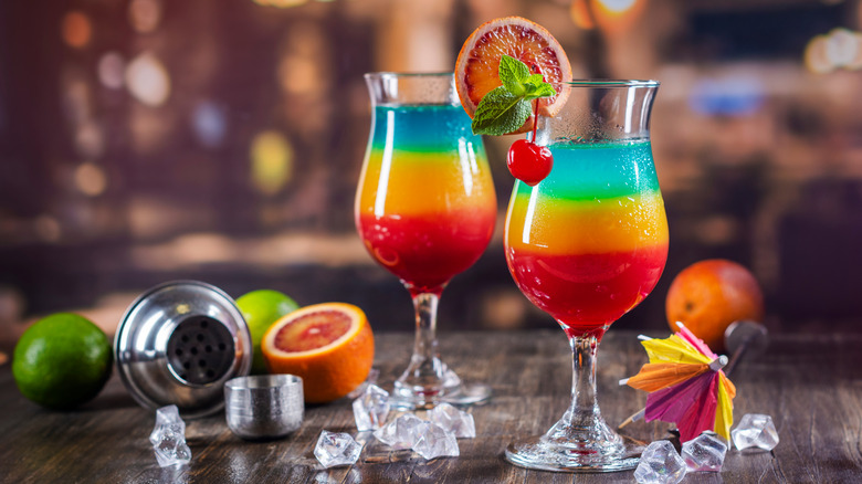 two multicolored layered cocktails