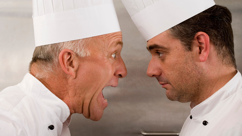 Angry chef yelling at employee