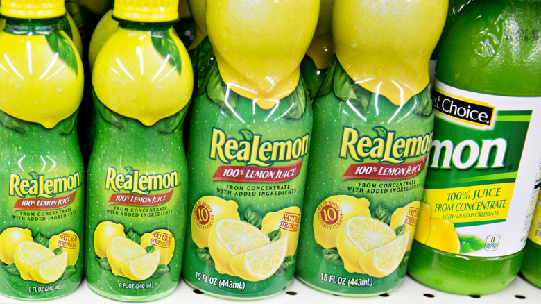 Bottles of lemon juice on a shelf